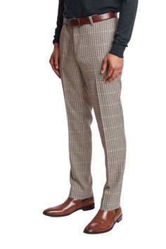 The downing suit pants are crafted from the same poly-rayon blend as the jacket, ensuring a cohesive and polished look. These slim-fit trousers feature a slant front pocket and a welt back pocket for added functionality. Whether you're heading to the office or out for an evening event, these pants offer both style and comfort, making them a versatile addition to your wardrobe.PRODUCT DETAILS: style 6416P slim-fitting suit pant slant front pockets welt back pockets 32-inch inseam with finished he Houndstooth Pants Outfit Men, Formal Tweed Pants With Herringbone Pattern, Houndstooth Menswear, Mens Plaid Pants Brown, Mens Brown Houndstooth Pants, Fall Suit, Formal Pants, Knit Outerwear, Suit Pant