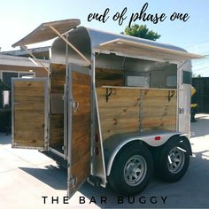 an enclosed trailer with the words end of phase one on it