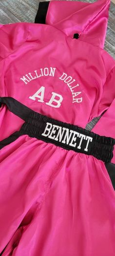 "\"🥊 Elevate Your Boxing Style with Our Personalized Robe and Trunks Set! 🥊 Looking for the perfect boxing outfit that screams 'champion'? Look no further! 🥊 **Customization available (add logos, extra names, and more). Send a message for a quote and special orders.** In this set, you'll receive: - One Robe with a Large Personalization on the back. - Stylish Trunks with your name personalized on the waist. Please note that gloves and shorts are NOT included in this listing. But don't worry, y Boxing Match Outfit Ideas Women, Mma Aesthetic, Boxing Outfits, Boxing Outfit, Boxing Robe, Boxing Style, Boxing Clothes, Short Gloves, Personalized Robe