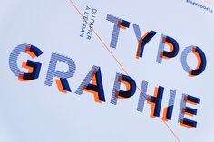 an image of some type of typographe on a computer screen that is blue and orange