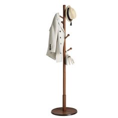 a coat rack with two hats on it