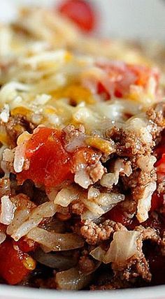 a close up of a plate of food with meat and vegetables