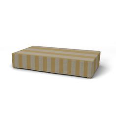 a striped box sitting on top of a white floor