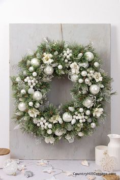 a christmas wreath is hanging on the wall