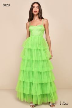 Treat any event like your own personal fashion show when you're wearing a show-stopping look like the Lulus Rule the Runway Lime Green Tulle Bustier Tiered Maxi Dress! This stunning dress is composed of sheer mesh tulle (atop a stretch knit lining) that shapes an alluring bustier-inspired bodice with seamed cups and supportive boning, a sweetheart neckline, and adjustable spaghetti straps. The high, fitted waist tops an A-line maxi skirt, adorned with fluffy tiers of tulle that are sure to make you look ""tulle-y"" mesmerizing as you dance the night away! Hidden back zipper/clasp. Fit: This garment fits true to size. Length: Floor length. Size medium measures 54.50" from shoulder to hem. Bust: Great for any cup size. Waist: Fitted - very fitted at natural waist. Hip: Not Fitted - fuller sk Evening Organza Overbust Dress, Spring Cocktail Dress With Overbust Shape, Summer Gala Evening Dress With Corset Back, Green Corset Dress With Spaghetti Straps, Green Fitted Corset Dress For Gala, Fitted Green Corset Dress For Gala, Summer Evening Dress With Corset Back For Gala, Fitted Green Corset Dress With Spaghetti Straps, Glamorous Tiered Fitted Dress