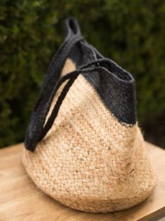 This oversized all natural jute market tote bag is perfectly accented with black banding and handles for a striking look. Handcrafted in natural jute fibers so you can be stylish and sustainable! Jute Totes, Market Tote Bag, Market Tote, Natural Jute, Leather Trims, All Natural, Vegan Leather, Shoulder Strap, Handles