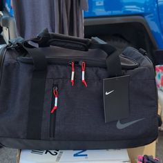 Nike Medium Golf Duffel Large Capacity Black Luggage For Outdoor Activities, Sporty Black Luggage For Overnight Trips, Casual Black Rectangular Luggage, Sporty Black Bag For Overnight Trips, Casual Large Capacity Black Luggage, Black Rectangular Luggage For Outdoor Use, Large Capacity Black Luggage For Outdoor, Nike Black Bags For Everyday, Rectangular Black Outdoor Luggage