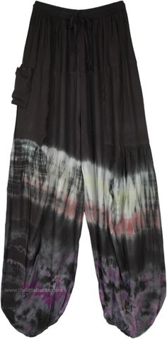 The dark black background on these harem pants sets the perfect base for the multicolor tie-dye pattern of subtle shades of green, brown and purple.  The elastic drawstring waist is great for slight size adjustments and a buttoned pocket on the side ensures handy storage. #tlb #SplitSkirtsPants #Yoga #vacationclothing #beachwrap #bohemianfashion #TieDye #Tall #Summerpants #HiippiePants #harempants #loungepants Bohemian Black Harem Pants With Elastic Waistband, Bohemian Black Relaxed Fit Bottoms, Black Hippie Bottoms With Elastic Waistband, Black Bohemian Pants For Loungewear, Black Hippie Long Pants, Black Bohemian Loungewear Pants, Bohemian Black Lounge Pants, Bohemian Black Loungewear Pants, Black Bohemian Harem Pants With Relaxed Fit