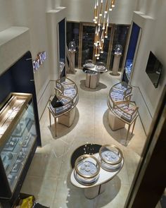 the inside of a jewelry store with lots of counter space