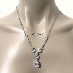 "A classic woodland wedding nature inspired teardrop bridal necklace featuring vines, leaves and flower petal pendant, made of sparkly clear cubic zirconia. This beautiful cz jewelry comes in tarnish-resistant silver rhodium plated chain. Necklace length is adjustable from 17\" (43cm) to 19\" (48cm) . View matching pieces or similar designs at https://etsy.me/2JAovjr View designs related to vines, branches, twigs or leaves at https://etsy.me/1E5j438 View designs with marquise shapes at https://e Wedding Teardrop Crown Jewelry With Cubic Zirconia, Wedding Teardrop Crown Cubic Zirconia Jewelry, Cubic Zirconia Teardrop Crown Wedding Jewelry, Wedding Cubic Zirconia Teardrop Crown, Delicate Teardrop Bridal Necklace For Wedding, Teardrop Cubic Zirconia Bridal Necklace With Sparkling Stones, Teardrop Bridal Necklace With Sparkling Cubic Zirconia, Teardrop Crystal Bridal Necklace With Elegant Design, Elegant Teardrop Crystal Bridal Necklace