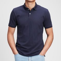 98% Cotton 2% Spandex Classic Fitted Gap Tops, Navy Fitted Cotton Polo Shirt, Navy Fitted Polo Collar Top, Classic Fitted Navy Polo Shirt, Classic Navy Fitted Polo Shirt, Fitted Navy Casual Polo Shirt, Classic Fitted Blue Polo Shirt, Fitted Collared Gap Tops, Gap Cotton Collared Tops