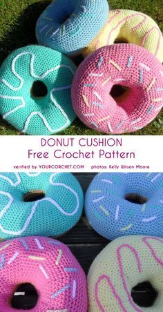 crocheted donuts are sitting in the grass