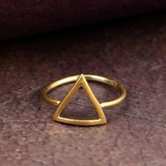 Triangle Brass Ring, Stacking Ring, Handmade jewelry, Bohemian Ring, Minimalist Ring, Geometric Ring, Abstract Modern Ring, Chunky Ring Material- Brass 1. Please share your numbers (in personalization box ) as required for shipping address details, and it'll help us to contact you easily. And don't worry about the privacy, we'll keep it safe with us, So try to cooperate with us. :) 2.Customers' satisfaction is our biggest priority, please contact us with any questions/queries for future or existing orders, and we will do our best to make sure you are happy with your order. 3.Please make sure to add the correct address during checkout. You can return your purchased item within 15 days after successful delivery. We offer a 100% "Money Back Guarantee" if you are not satisfied with your purcha Minimalist Brass Toe Ring, Minimalist Brass Stackable Toe Rings, Minimalist Hand Forged Midi Rings As Gift, Minimalist Brass Midi Rings For Wedding, Minimalist Hand Forged Open Midi Rings, Handmade Minimalist Brass Midi Rings, Handmade Minimalist Brass Stackable Rings, Minimalist Brass Midi Rings With Open Design, Minimalist Brass Open Midi Rings