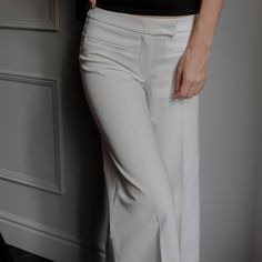 Vintage Stretchy Cream Cotton Culottes Pants - Wise Fashion - Sustainable, Fair and Ethical - Absolutely gorgeous culotte pants from early 1990s ; - Perfect condition;  - 98% cotton and 2% elastane with stunning simple cut and tailoring; - Zips up in front; - Super soft. Measurements: Waist - 65cm Hips - up to 92cm Length - 76cm White High-waisted Culottes For Work, Elegant White Culottes, Elegant White Straight Culottes, White Wide-leg Dress Pants For Office, White Full-length Wide Leg Office Pants, White Wide Leg Full Length Pants For Office, White Full Length Wide Leg Pants For Office, White Culottes For Spring Workwear, White Culottes For Workwear In Spring