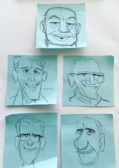 four drawings of people's faces drawn on blue paper with green crayons