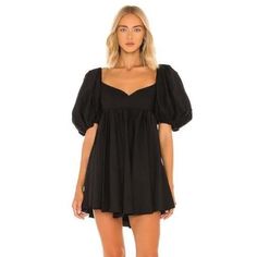 This Babydoll Dress Features Delicate Puff Sleeves. Sweetheart Neck Elbow-Length Puff Sleeves Back Zipper Closure 78% Cotton/20% Polyamide/2% Elastane Dry Clean Imported Size & Fit About 32" From Shoulder To Hem Model Measurements: 5'10" Tall Model Is Wearing A Us Size Small Billowy Puff Sleeve Dress For Party, Black Puff Sleeve Dress For Spring, Billowy Mini Dress With Puff Sleeves, Black Voluminous Dress With Gathered Sleeves, Black Mini Dress With Lantern Sleeves And Ruffles, Black Mini Dress With Ruffles And Lantern Sleeves, Black Puff Sleeve Dress With Gathered Sleeves For Daywear, Black Puff Sleeve Dress For Daywear, Black Puff Sleeve Dress With Ruffles