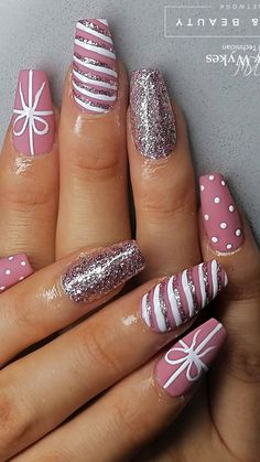 Christmas Nails Cute Styles That Will Melt Your Heart! 🎁 Get ready to fall in love with these Christmas Nails Cute styles that are perfect for the season! From Christmas Gel Nails to Christmas Nails Acrylic, these designs will have Her Nails looking festive and fun. 🎅✨ Looking for Cute Christmas Nails that are easy to do? We’ve got you covered with Christmas Nails Easy ideas that bring holiday cheer to your fingertips. Try classic Xmas Nails or add a sweet twist with Candy Cane Nails for that... Almond Nail Ideas Winter, Pink Christmas Acrylic Nails Short, Christmas And Winter Nails, Easy Beginner Christmas Nails, Christmas Easy Nail Designs, Pink Candycane Nails, Simple December Nails Short, Cute Christmas Nails Acrylic Coffin, Early Christmas Nails