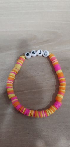 a bracelet with the word down written on it