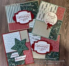 four christmas cards with different designs on them