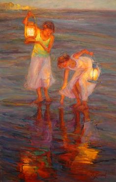 two women are walking in the water with an umbrella and some lanterns on their feet