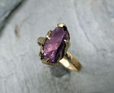 As seen in VOGUE Raw Rough Purple Orchid Spinel by byAngeline Untreated Gold Sapphire Ring For Anniversary, Hand Cast 14k Gold Wedding Rings, Handmade Yellow Gold Amethyst Ring For Wedding, Unique Hand Forged Ruby Ring For Anniversary, 14k Gold Hand Cast Wedding Rings, Hand Forged Gold Sapphire Wedding Ring, Yellow Gold Hand Cast Wedding Rings, Unique Gold Amethyst Ring For Wedding, Rustic Amethyst Ring