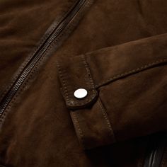 This moto jacket is crafted from high-quality suede leather and has a rugged, western-inspired style. It features a stand collar, full front zip closure, horizontal zip chest pockets, angled zip hand pockets, leather zipper pulls and snap cuffs. At Stetson, we've been outfitting men who venture into cold, weather-worn territories since 1865—this is quality you can rely on. Stand Collar Full Front Zip Closure Horizontal Zip Chest Pockets Angled Zip Hand Pockets Leather Zipper Pulls Snap Cuffs Lea Classic Suede Leather Jacket With Zipper, Brown Leather Outerwear With Zip Cuffs, Classic Suede Outerwear With Zipper Closure, Fall Suede Leather Jacket With Zipper, Fall Suede Leather Jacket With Zipper Closure, Suede Biker Jacket With Zipper For Work, Suede Leather Jacket With Zipper For Fall, Rugged Suede Leather Jacket For Fall, Leather Jacket With Suede Lining