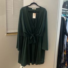 Green Wrap Dress With Long Bell Sleeves. Front Has A Second Layer Which Ties At The Waist For Additional Detailing. This Dress Is Perfect For Holiday Events! A Beautiful Soul Is Altered State’s Plus Size Line. Flowy Long Sleeve Dress With Tie Waist, Green Tie Waist Dresses For Brunch, Green Wrap Dress, Altered State, A Beautiful Soul, Green Wrap, Long Sleeve Wrap Dress, Holiday Events, Green Long Sleeve