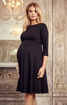 Sienna is your dream dress throughout pregnancy. With a classic boat neckline in our exquisite Ponte Roma jersey for the most wonderful drape. Cut to flatter in a gently tailored shape with princess seams to the bust and a paneled skirt that floats to the perfect length. A glamorous ¾ sleeve adds a relaxed sophistication that’s easy to dress up for any occasion, work or weekends. Elegant Bump-friendly Maternity Dress, Elegant Fitted Maternity Midi Dress, Elegant Fitted Bump-friendly Dresses, Elegant Fitted Midi Maternity Dress, Elegant Fitted Midi Dress For Maternity, Elegant Maternity Dress With Fitted Bodice, Elegant Maternity Dress With Empire Waist, Elegant Stretch Maternity Dress, Elegant Long Sleeve Bump Friendly Dress