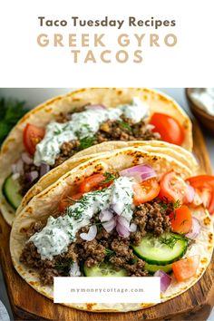 two tacos with meat, tomatoes and cucumber on top are shown in this recipe