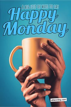 a person holding a coffee cup with the words happy monday on it