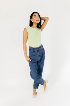 take any outfit to trendy new levels with these baggy dark-wash jeans. with their retro high-rise + tapered silhouette, they’re a timeless take on the ‘barrel jean’ trend. the perfect vintage-inspired bottoms for any casual outfit endeavor. dark wash // tapered fit, high waisted, zip fly, snap button hem detail, double hook + eye closure, belt loops, front pleat detailing paired with our best of me top + new england floral top model is 5'8" + wearing a small measurements are approximate + taken Chic Dark Wash Tapered Leg Jeans, Trendy Dark Wash Cropped Jeans With Tapered Leg, Trendy Dark Wash Tapered Leg Cropped Jeans, Chic Dark Wash Tapered Leg Cropped Jeans, Dark Wash Mom Fit Cropped Jeans With Tapered Leg, Trendy Cropped Jeans In Dark Wash For Workwear, Trendy Dark Wash Cropped Jeans For Work, Dark Wash Retro Jeans For Work, Retro Style Dark Wash Jeans For Workwear