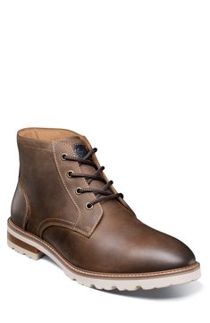 A stitched welt and sturdy lugs lend rugged appeal to a smooth leather lace-up boot with a padded collar and cushioned insole built for comfort. Lace-up style Removable, cushioned insole Leather upper/textile lining/rubber sole Imported Casual Lace-up Boots With Goodyear Welt Moc Toe, Casual Lace-up Boots With Goodyear Welt Construction, Leather Combat Boots With Goodyear Welt For Work, Brown Lace-up Chukka Boots With Lug Sole, Classic Lace-up Work Boots With Lug Sole, Rugged High-top Lace-up Boots With Goodyear Welt, Leather Chukka Boots With Lug Sole Plain Toe, Leather Lace-up Combat Boots With Stitched Sole, Leather Chukka Boots With Lug Sole