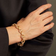 Our signature, hand-linked Oval Chain Bracelet encrusted with all over pave diamonds in Yellow Gold. This one-of-a-kind necklace features 7.21cts of Diamonds and is made end-to-end in Los Angeles. Pave Diamonds, 7.21cts, 18k Yellow Gold Made to Order: Available in all 18K White Gold and all 18k Rose Gold Available in customizable lengths Dimensions : Length: 7.75" Shipping: We offer complimentary overnight domestic shipping with your order once your order has been fulfilled. Please allow 4-6 wee Luxury Pave Setting Chain Bracelet For Anniversary, Luxury Chain Bracelet With Pave Setting For Anniversary, Classic Formal Bracelet With Pave Setting, Classic Formal Chain Bracelet With Pave Setting, Luxury Cubic Zirconia Diamond Bracelet With Oval Links, Luxury Oval Link Bracelet With Diamond Accents, Luxury Diamond Link Bracelet For Anniversary, Luxury Link Diamond Bracelet For Anniversary, Luxury Diamond Oval Link Bracelets