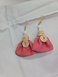 WOMEN FABRIC EARRING - Red Fabric Earring, Women Jewellery Gift, Earring for Women, Women Drop Earring, Fabric Women Earring, Earring Gift Discover the perfect blend of bohemian charm and modern elegance with our Women Fabric Earring. These drop earrings feature unique fabric elements and an ear hook design, making them a must-have for women who love distinctive and stylish accessories. Key Features: Boho Chic Appeal: Elevate your style with these fabric earrings that embody the free-spirited an Boho Cloth Earrings, Red Drop Earrings With Latkans, Red Earrings With Latkans For Gift, Handmade Pink Earrings For Celebration, Handmade Wrap Earrings As Gift, Pink Earrings With Latkans For A Gift, Red Dangle Earrings With Latkans, Red Latkans Earrings Gift, Red Beaded Earrings With Latkans For Gift