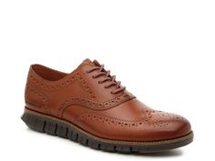 Cole Haan-ZeroGrand Wingtip Oxford The ZeroGrand wingtip oxford from Cole Haan flaunts the perfect balance of tailored and casual style. Featuring a sporty EVA midsole with Grand.øs technology, this lace-up can be dressed up or down for any outfit. Brown Low-top Lace-up Shoes For Business Casual, Brown Wingtip Sneakers For Business, Brown Wingtip Lace-up Shoes For Business Casual, Casual Brogue Lace-up Shoes For Work, Brown Low-top Brogue Oxfords, Brown Low-top Oxfords With Brogue Detailing, Casual Lace-up Shoes With Brogue Detailing For Work, Casual Wingtip Oxfords For Business, Casual Wingtip Lace-up Business Shoes