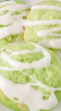 green tea cookies with white icing on a plate