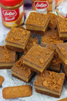 there are many pieces of food on the table together, including peanut butter and graham crackers