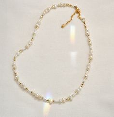 ★ All of our necklaces are handmade and made-to-order ★ Order will be shipped in a gift box ★ Free repairs for broken clasps or crimps for up to 30 days after delivery ★ These dainty, minimalist necklaces are trendy enough for day and night, and make great gifts for birthdays, Christmas, Mother's Day, and other special occasions ★ Great for layering with our other designs  ★ Free shipping All designs ©Lily Shahida Designs Pearl Shell, Minimalist Necklace, Chain Styles, Seed Beads, Mothers Day, Necklace Lengths, Necklace Etsy, Free Design, Gold Necklace