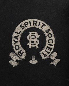 the royal spirit society logo on a black shirt