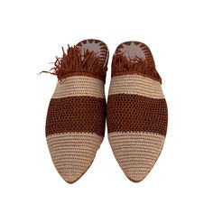 The slipper revisited: comfortable, with a modern design and, in two-tone raffia. These shoes were handmade in Morocco, and allow for the artisans and women who created them to make a fair living off the hard-work they put in, at a fair price. Handmade using natural materials - raffia and leather. World-wide delivery. Beige Slip-on Mules With Woven Sole, Leather Sole Slip-on Mules For Vacation, Brown Slip-on Espadrilles With Woven Sole, Brown Straw Slip-on Sandals, Spring Brown Woven Mules, Casual Brown Woven Mules, Comfortable Brown Summer Loafers, Summer Comfortable Brown Loafers, Brown Summer Loafers Comfortable Style