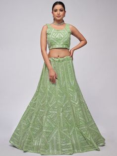 Elevate your Mehendi look with our marvelous green heavy sequins net lehenga choli. This stunning ensemble features captivating green net material adorned with heavy sequin work and intricate thread embroidery. The monochrome green color exudes elegance and sophistication, making it perfect for weddings, cocktail receptions, engagements, and Mehendi ceremonies.
The semi-stitched lehenga can be customized up to 42 inches, ensuring a perfect fit for any body shape. The unstitched blouse material g Mehendi Look, Anarkali Lehenga Gowns, Net Lehenga Choli, Engagement Gown, Lehenga Crop Top, Saree With Belt, Anarkali Lehenga, Lehenga Choli Wedding, Stitched Lehenga