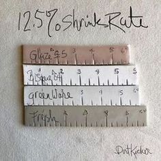 three rulers are shown with writing on them