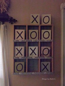 the wall is decorated with different types of tic - tac - toe tiles