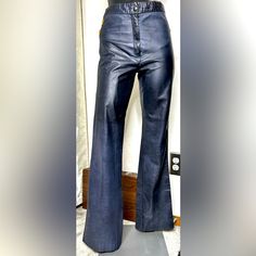 1960’s-1970’s Vintage/ Beautiful Dark Blue Leather Pants Is High Rise/ With Sexy Stitching Butterfly Designs On The Back. Slightly Flared Legs. Trending Style/ Waist: 27” Hip:29” Front Rise: 9”5 Thigh 8” Inseam:32.5 Outseam:39” Leg Opening :9” Length : 42.5” Please Feel Free To Ask Me Anything.. Fitted Blue Leather Bottoms, Fitted Leather Wide Leg Jeans, Fitted Wide Leg Leather Jeans, Fitted Leather Wide-leg Jeans, Retro Fitted Bottoms For Night Out, Fitted Retro Bottoms For Night Out, Vintage Fitted Leather Pants For Fall, Fitted Blue 1970s Style Bottoms, Fitted 1970s Style Blue Bottoms