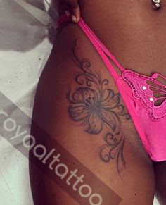 a woman with a butterfly tattoo on her stomach and side view of the bottom half of her body