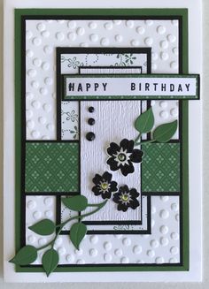 a handmade birthday card with black and white flowers