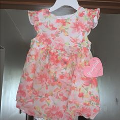 Infants Floral Dress Spring Ruffle Dress For Playwear, Summer Flutter Sleeve Dress For Playwear, Spring Ruffled Dresses For Playwear, Ruffled Dresses For Playwear In Spring, Spring Playwear Dresses With Flutter Sleeves, Lined Dress For Spring Dress-up Occasion, Cute Peach Beach Dress, Spring Playtime Dress With Lining, Lined Dresses For Playtime In Spring