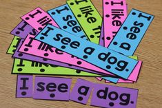 several different colored and black words are placed on top of each other, with the word i see a dog