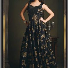 Black And Gold Dress With Tassels .Its A Indonwestern Fusion Traditional Black Party Dress, Traditional Black Floor-length Dress, Black Dress For Festive Occasions, Traditional Black Fitted Dress, Traditional Black Maxi Length Dress, Festive Black Maxi Dress, Black Floor-length Dress For Festive Occasions, Traditional Black Evening Dress, Black Sleeveless Festive Dress