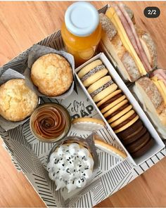 an assortment of pastries and desserts on a tray